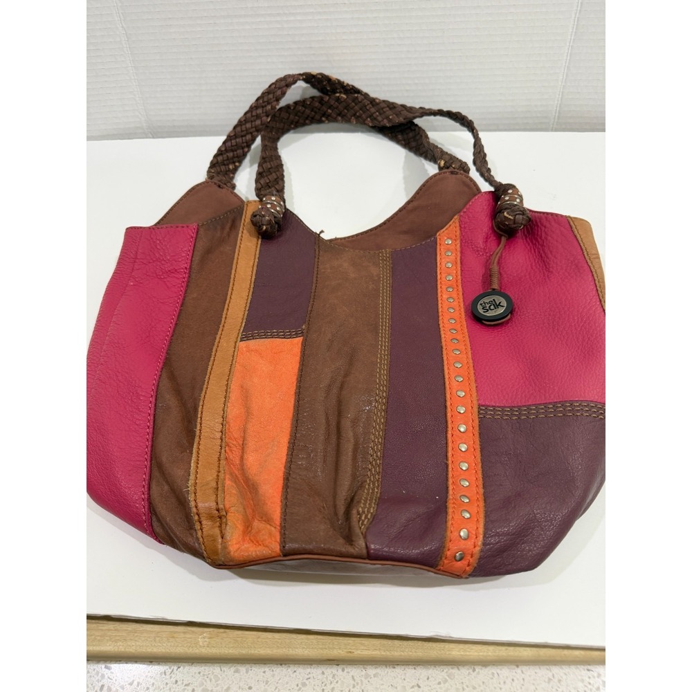 The Sak patchwork hobo shoulder bag, braided handle, stud accents